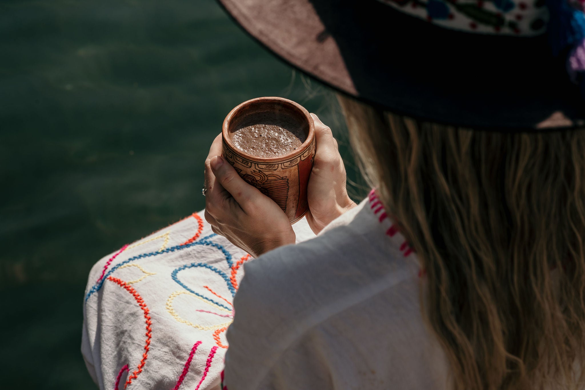 A girl with wild cacao collective