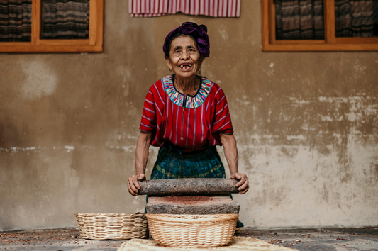 Abuelita Magdalena preparing Cacao